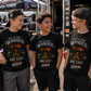 Kids wearing funny 10mm socket youth racing shirts at a motorsports event