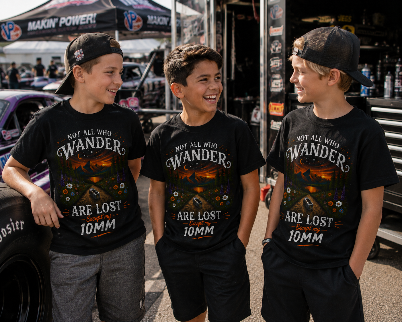 Kids wearing funny 10mm socket youth racing shirts at a motorsports event