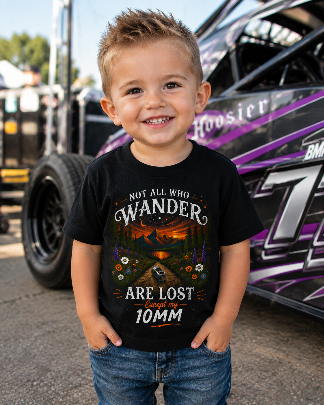Boy wearing Not All Who Wander Are Lost Except My 10mm toddler racing T-shirt by Car Chix