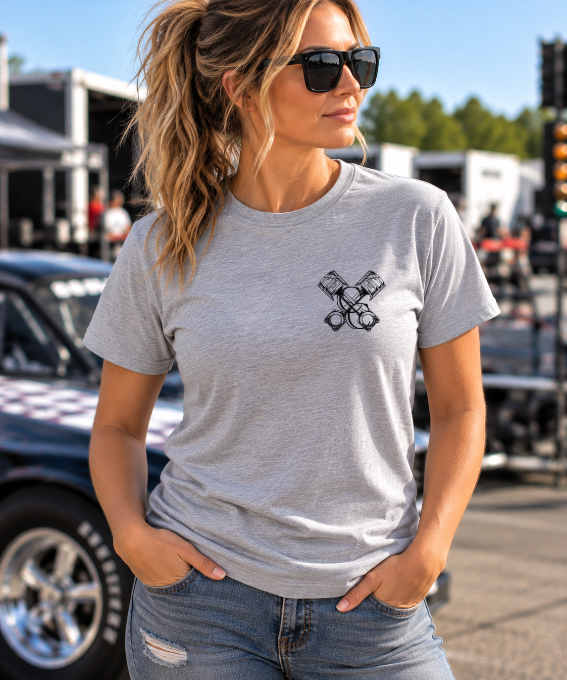 Woman modeling sport gray unisex T-shirt front view at a racetrack by Car Chix