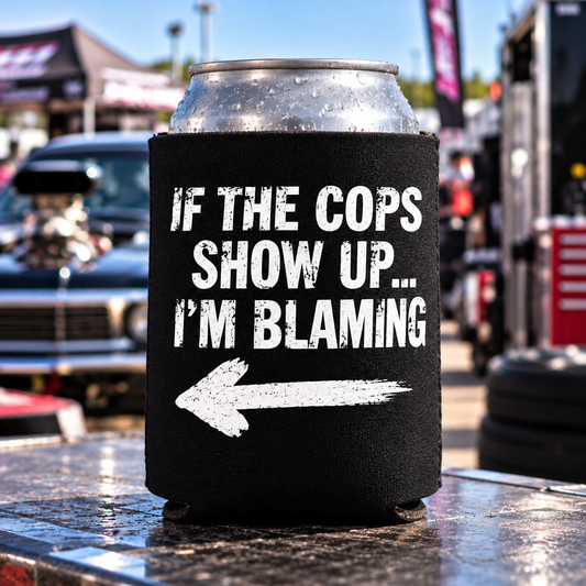 Black Car Chix If The Cops Show Up I'm Blaming foam can koozie with distressed white lettering and left-pointing arrow, displayed at a drag racing event.