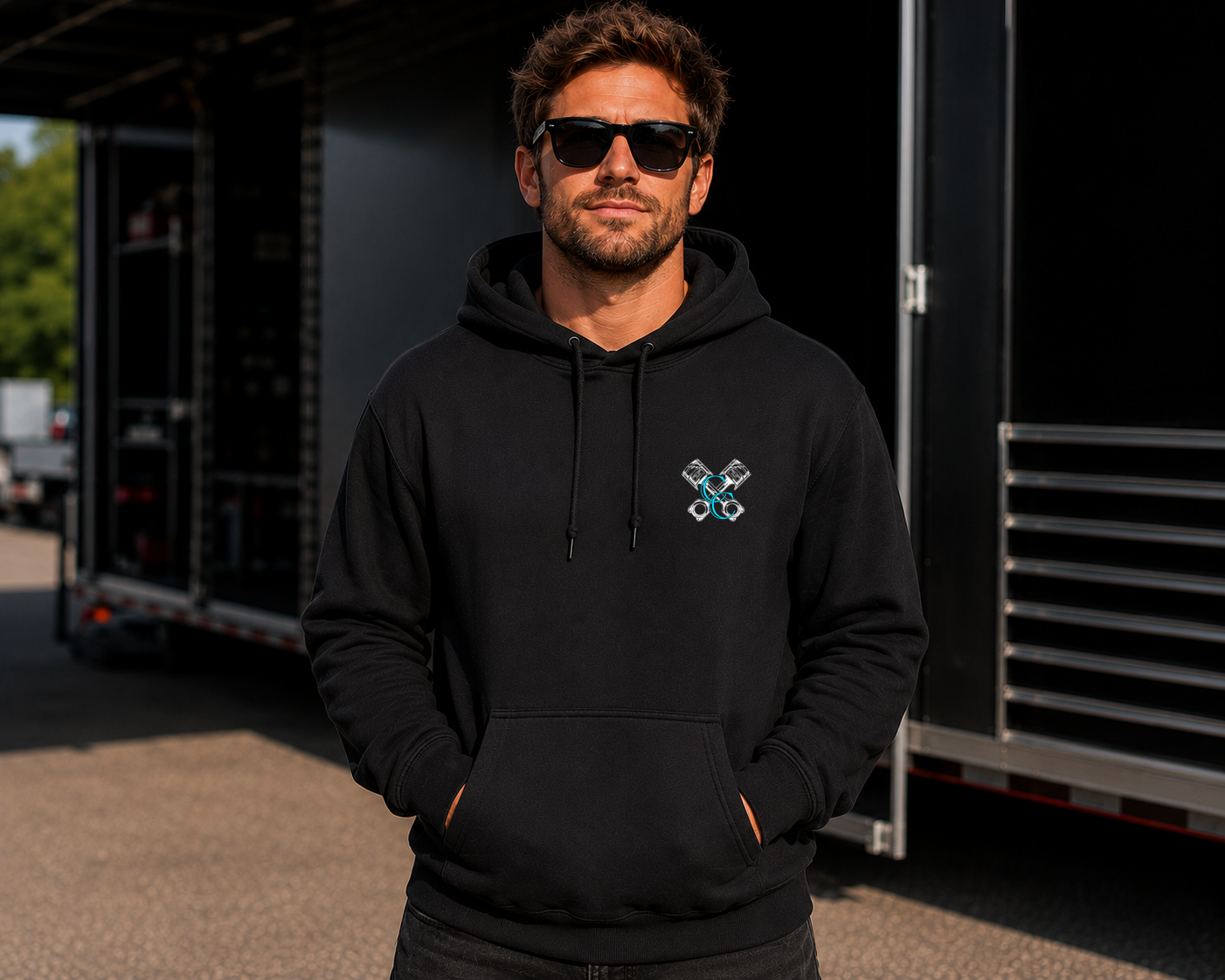 Front of black My Dog & I Talk Sh*t About You hoodie with neon blue Car Chix piston chest logo