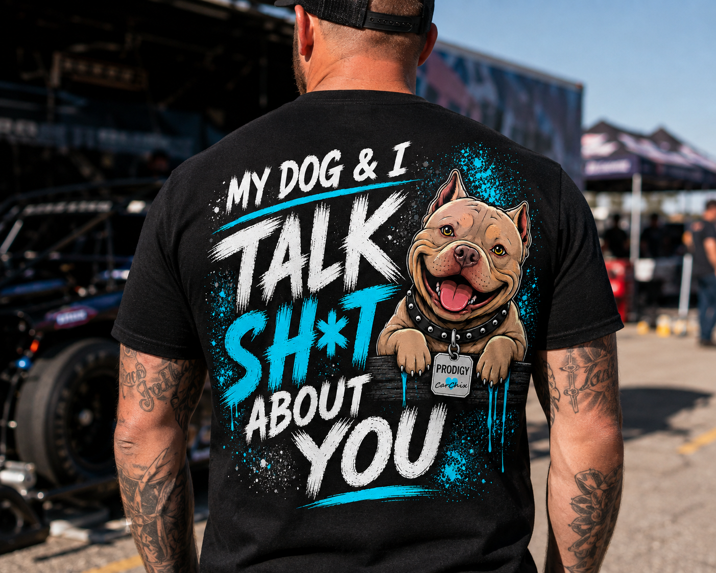 Man wearing black My Dog & I Talk Sh*t About You T-shirt with neon blue Prodigy design by Car Chix