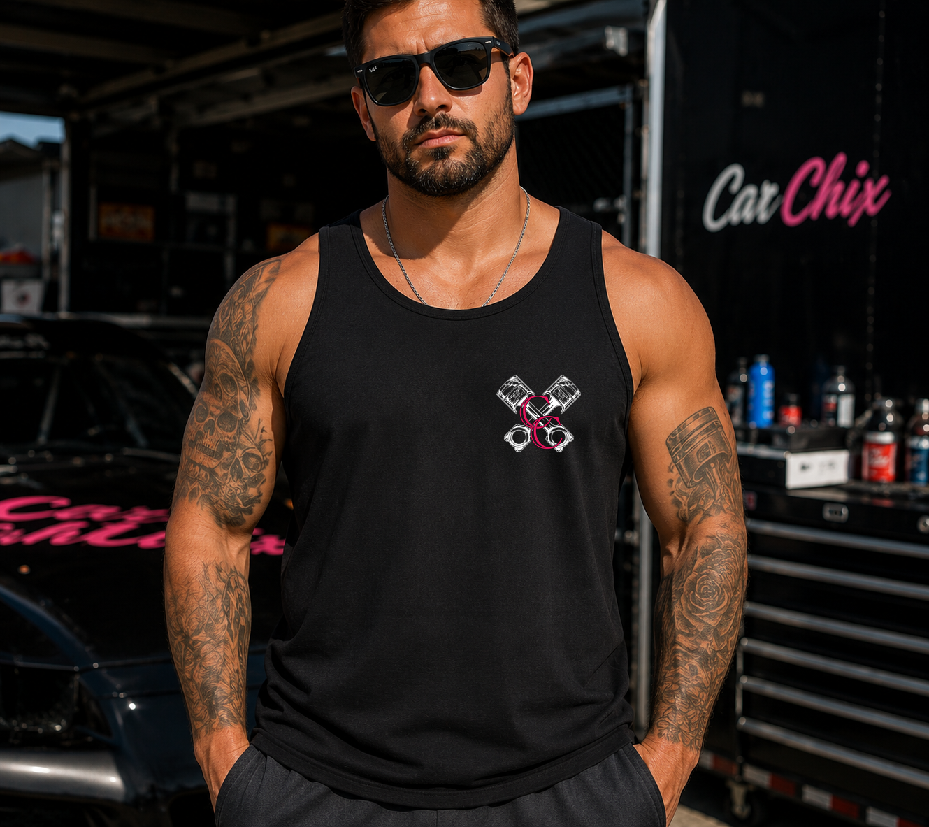 Front of black My Dog & I Talk Sh*t About You men’s tank with neon pink Car Chix piston chest logo