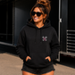 Front of black My Dog & I Talk Sh*t About You hoodie with neon pink Car Chix piston chest logo