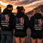 Group wearing black Race Cars Burnouts & Freedom hoodies at a drag racing event by Car Chix