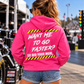 Woman wearing pink Want Me to Go Faster So Did Your Mom racing hoodie by Car Chix