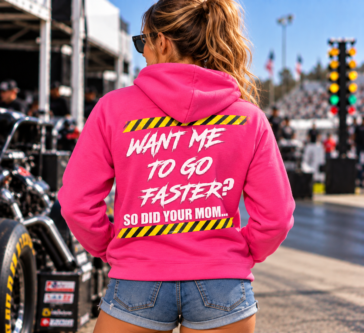 Woman wearing pink Want Me to Go Faster So Did Your Mom racing hoodie by Car Chix