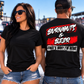 Man and woman wearing black Burnouts and Beer That's Why I'm Here racing T-shirts at the drag strip