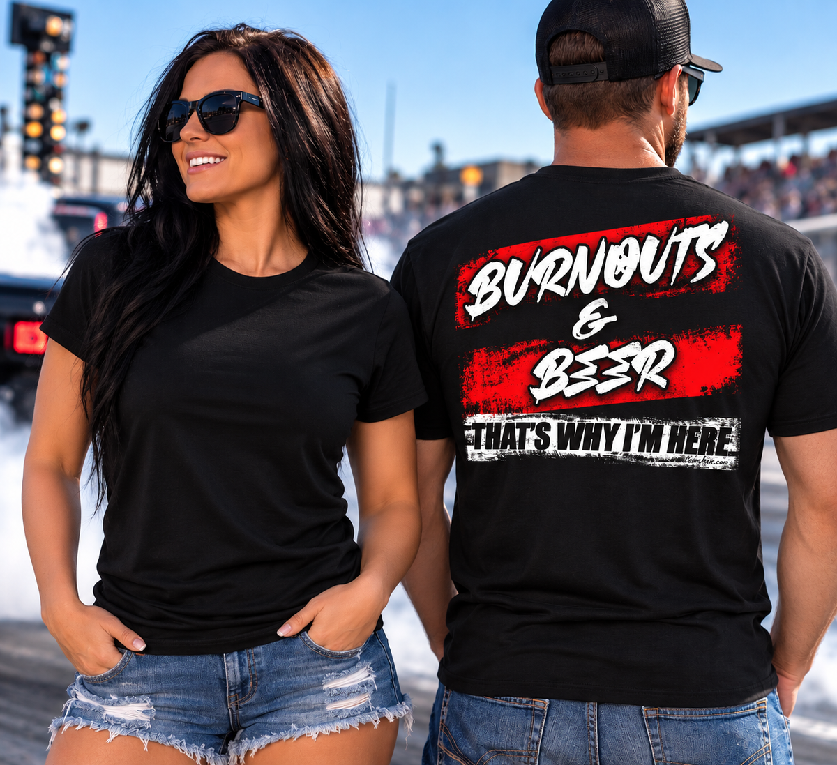 Man and woman wearing black Burnouts and Beer That's Why I'm Here racing T-shirts at the drag strip