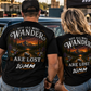 Man and woman wearing funny 10mm socket mechanic shirts at a car show