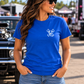 Woman wearing blue Car Chix unisex T-shirt shown from the front at a car show, featuring a plain chest area for the Car Chix Piston logo.
