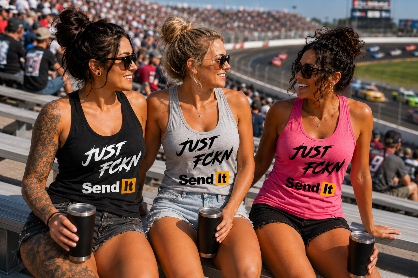 Women wearing Car Chix Just Fckn Send It racing tanks in the grandstands