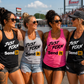 Women wearing Just Fckn Send It racerback tank tops at a motorsports event
