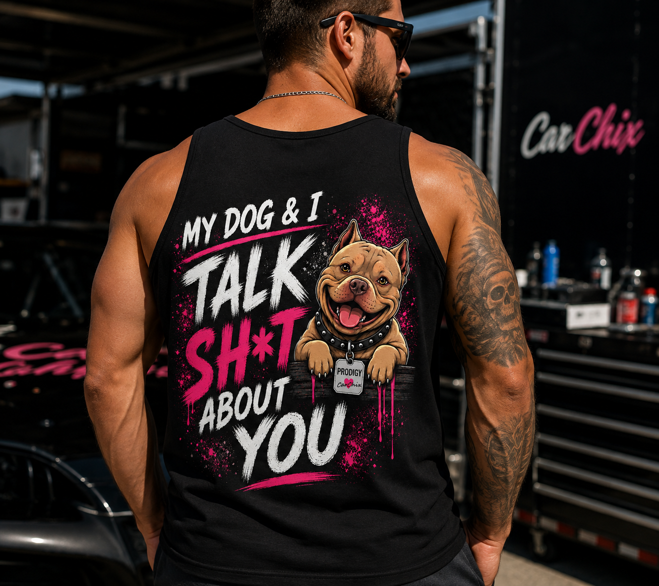 Man wearing black My Dog & I Talk Sh*t About You tank top with neon pink Prodigy design by Car Chix