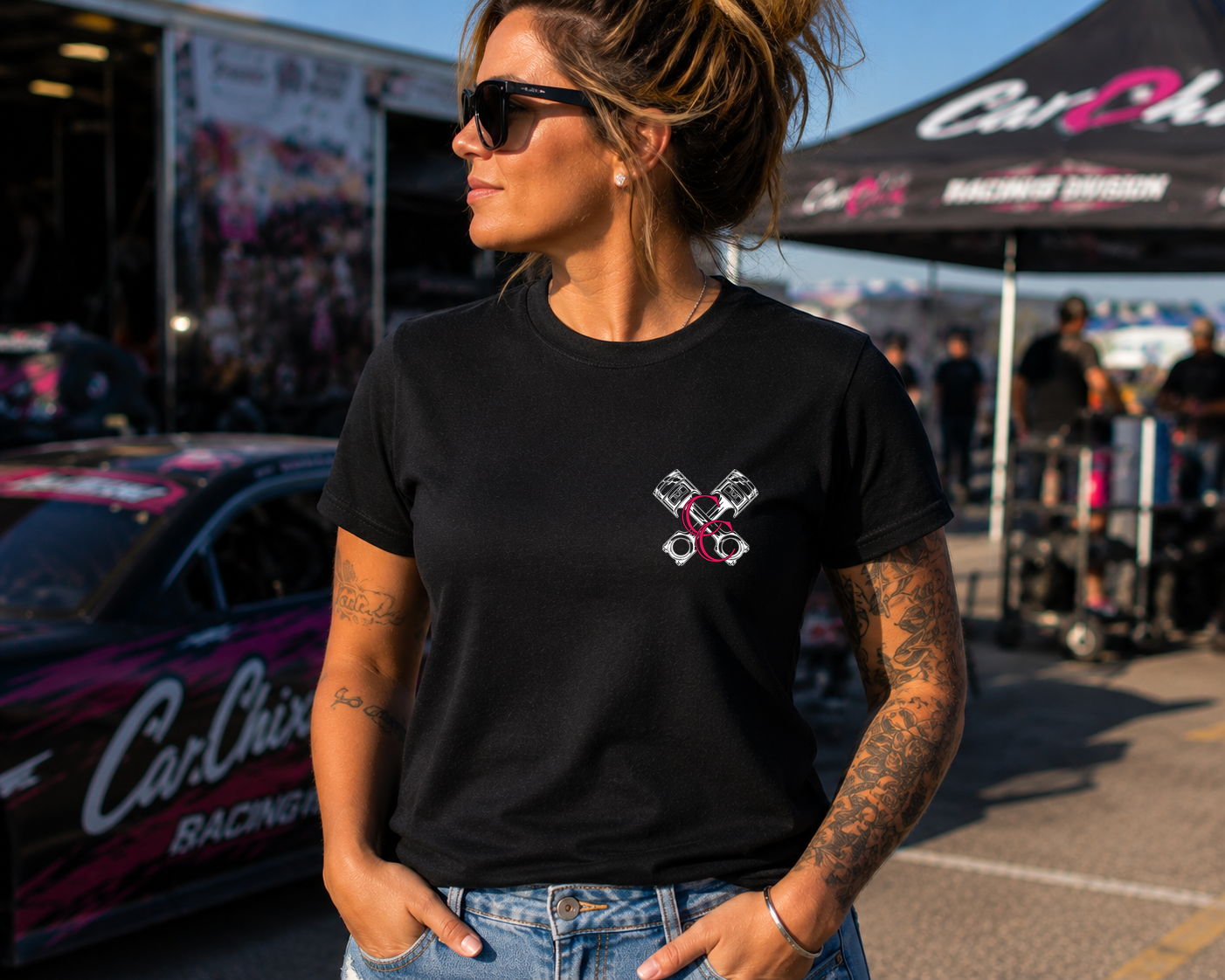 Woman wearing black My Dog & I Talk Sh*t About You T-shirt with neon pink Prodigy design by Car Chix