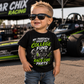 Toddler boy wearing My Parents Spent My College Fund on Race Car Parts racing shirt at the racetrack
