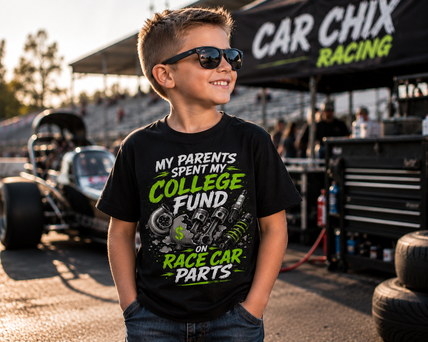 Boy wearing My Parents Spent My College Fund on Race Car Parts youth racing shirt at the drag strip