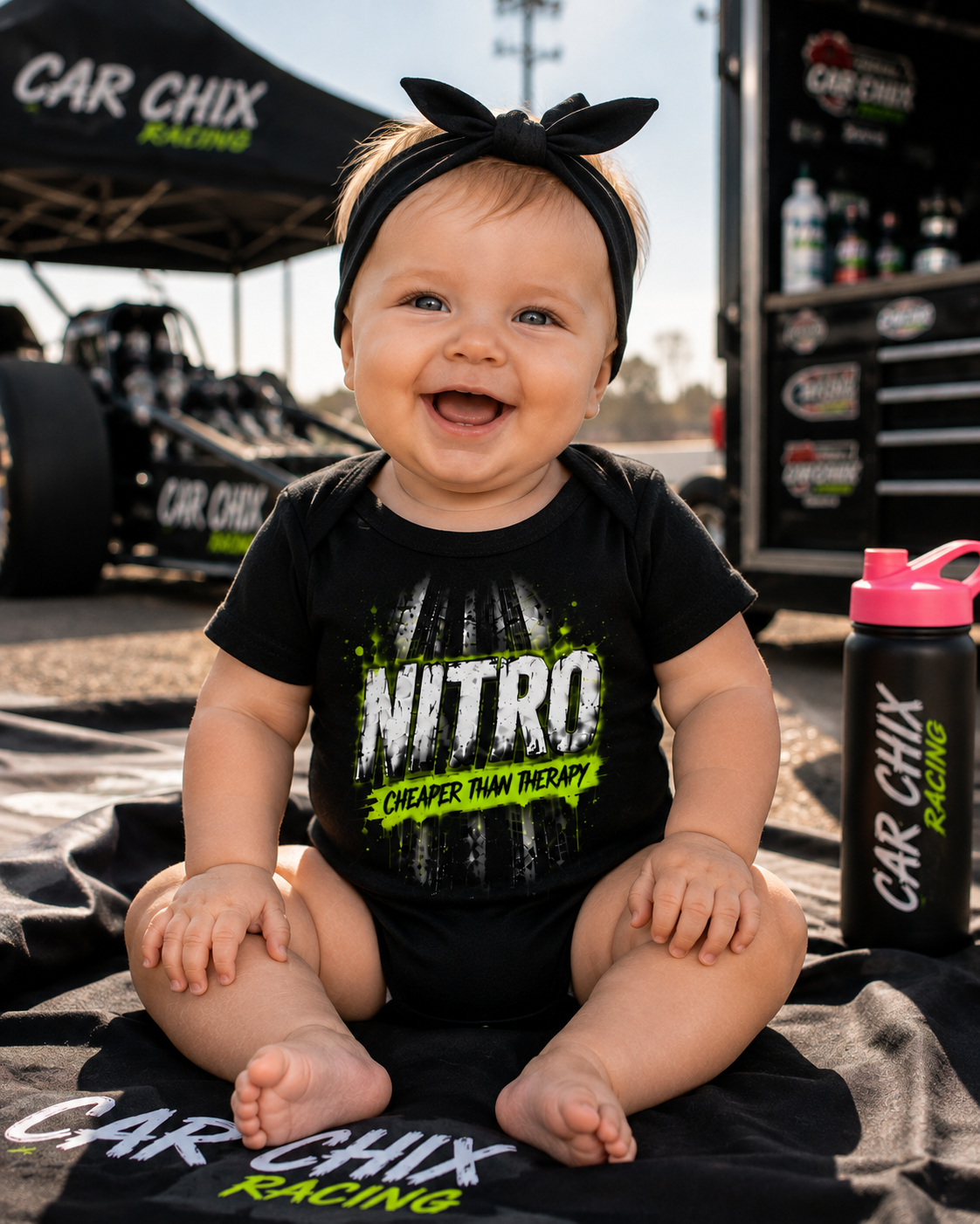 Smiling baby wearing Nitro Cheaper Than Therapy drag racing onesie by Car Chix