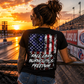 Woman wearing black Race Cars Burnouts & Freedom racing T-shirt at sunset by Car Chix